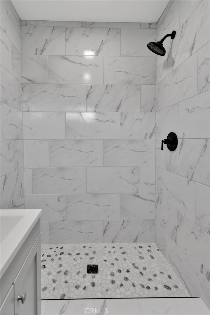 24521 Myers Avenue Moreno Valley, CA 92553 - Photo 5 of 9 a bathroom with a shower