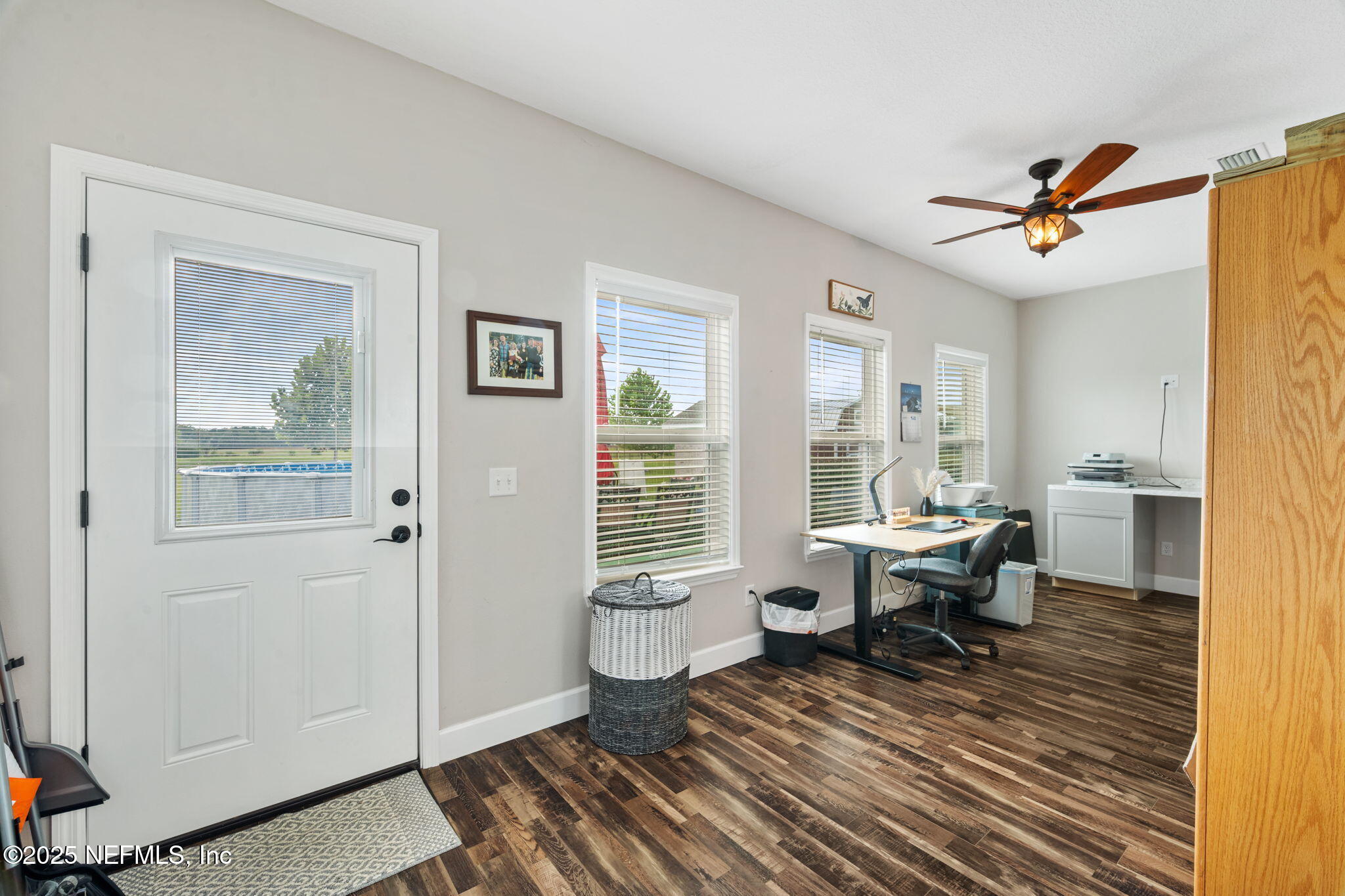 272344 Conner-Nelson Hilliard, FL 32046 - Photo 13 of 56 a living room with furniture two window and a table