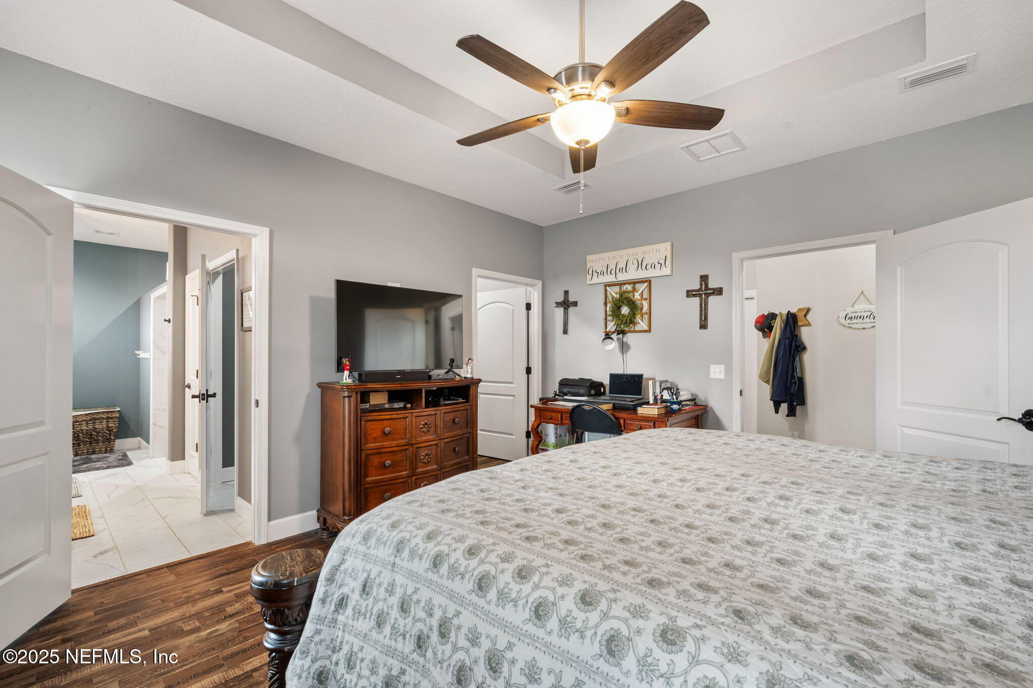272344 Conner-Nelson Hilliard, FL 32046 - Photo 15 of 56 a bed room with a bed and a television