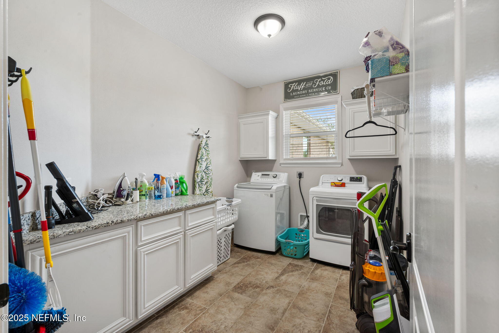 272344 Conner-Nelson Hilliard, FL 32046 - Photo 22 of 56 a room with storage and utility
