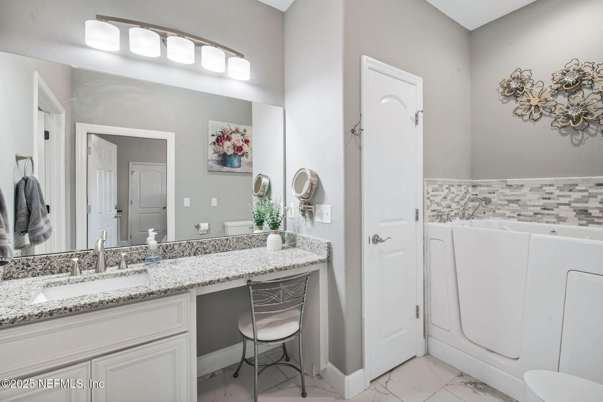 272344 Conner-Nelson Hilliard, FL 32046 - Photo 24 of 56 a bathroom with a granite countertop sink and a mirror