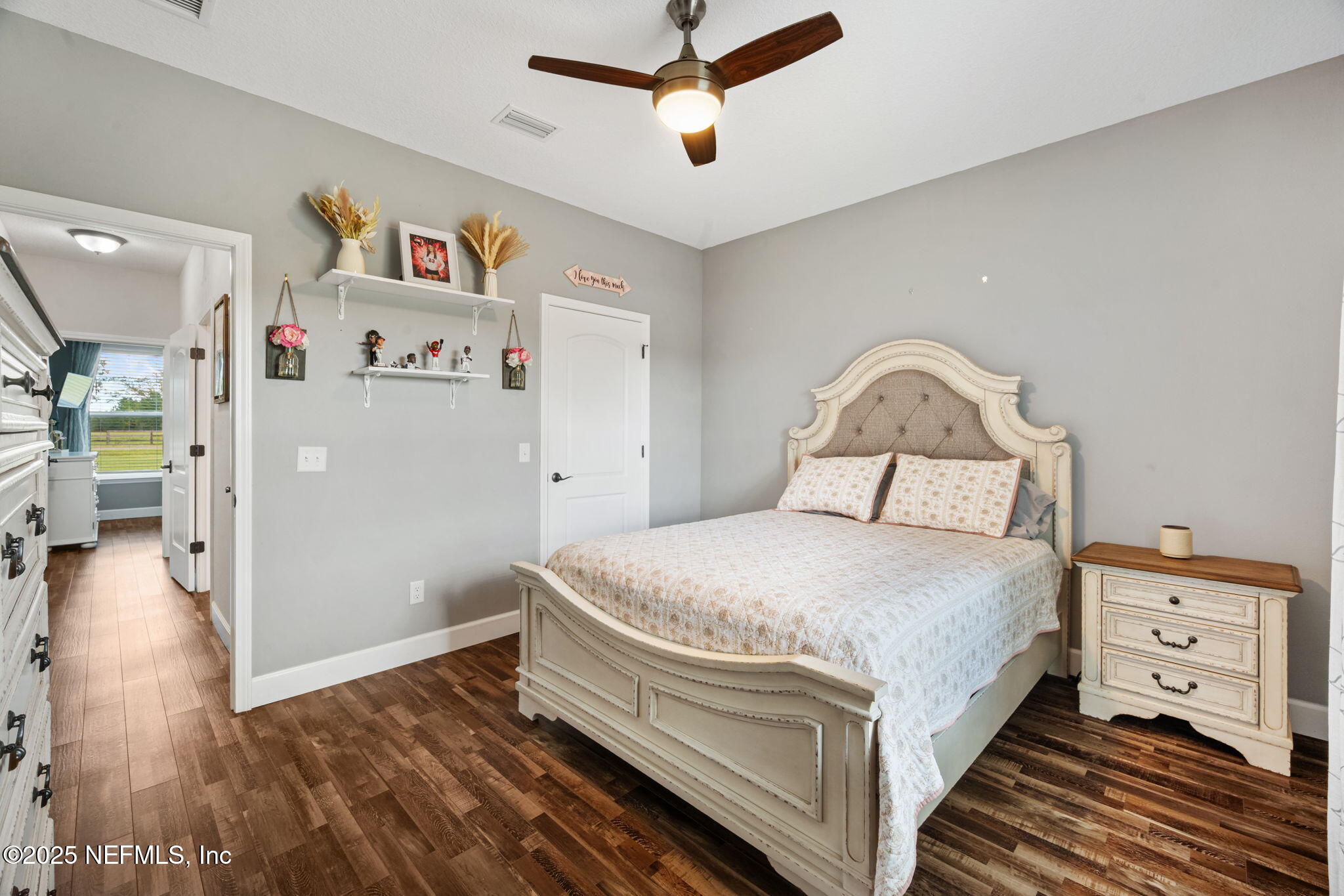 272344 Conner-Nelson Hilliard, FL 32046 - Photo 36 of 56 a bedroom with a bed and a dresser