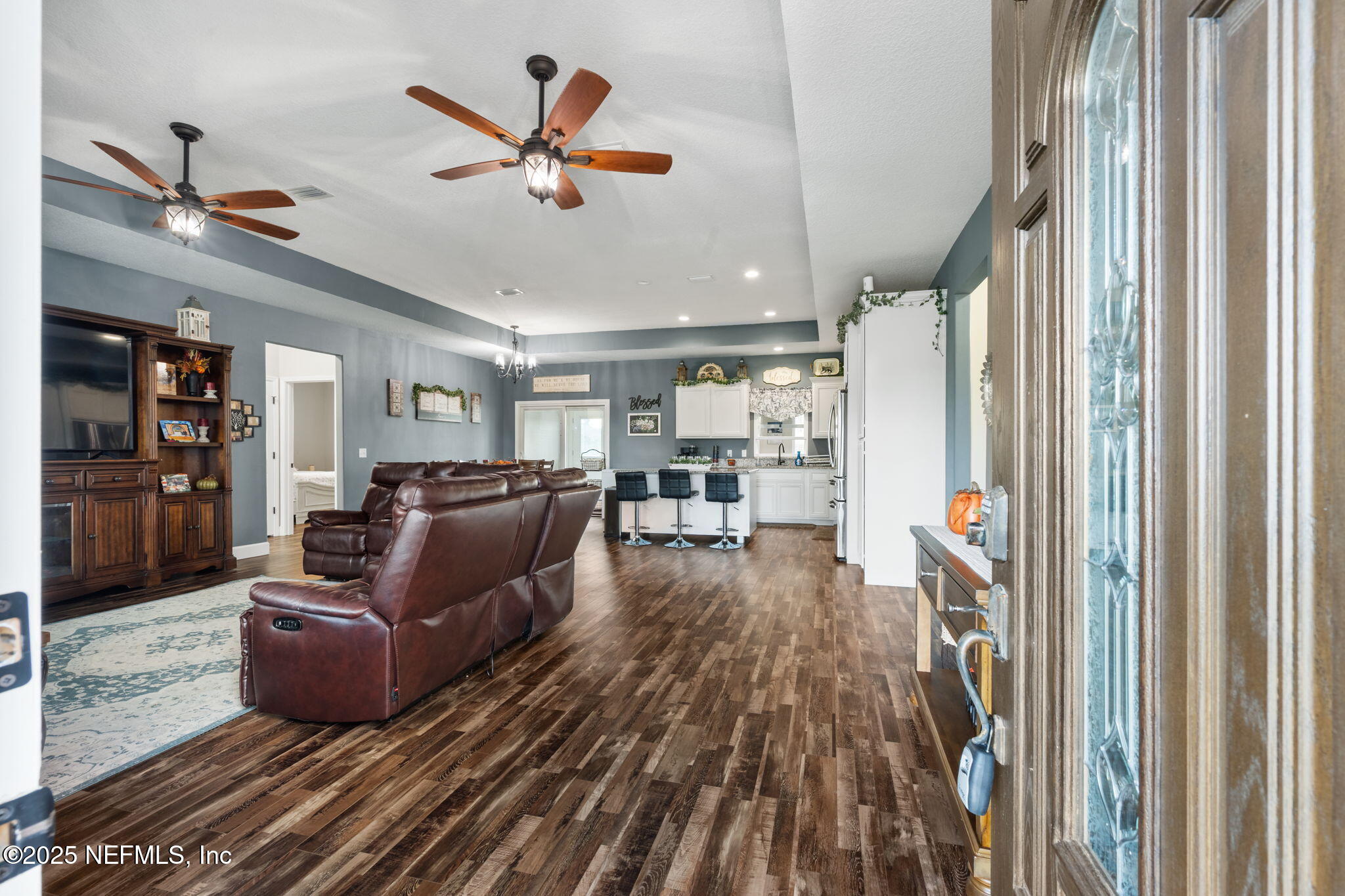 272344 Conner-Nelson Hilliard, FL 32046 - Photo 4 of 56 a living room with furniture and a wooden floor