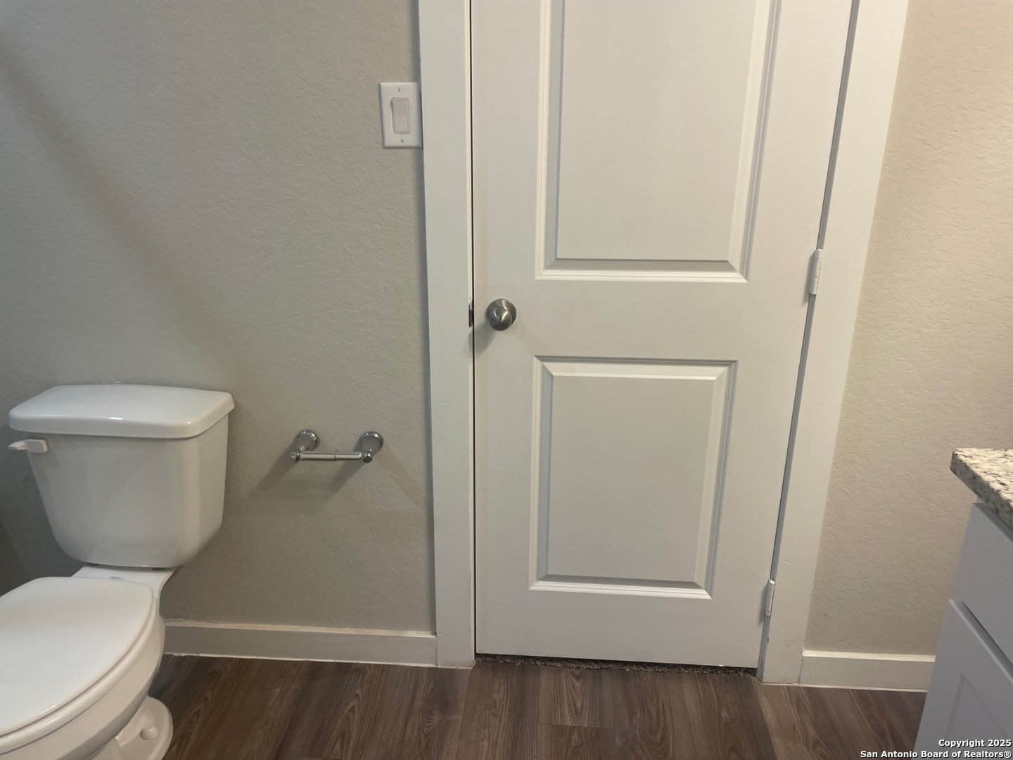 8318 Runner Cove, Unit 101 San Antonio, TX 78249 - Photo 12 of 36 a bathroom with a toilet