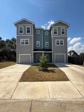 a front view of a house with entertaining space