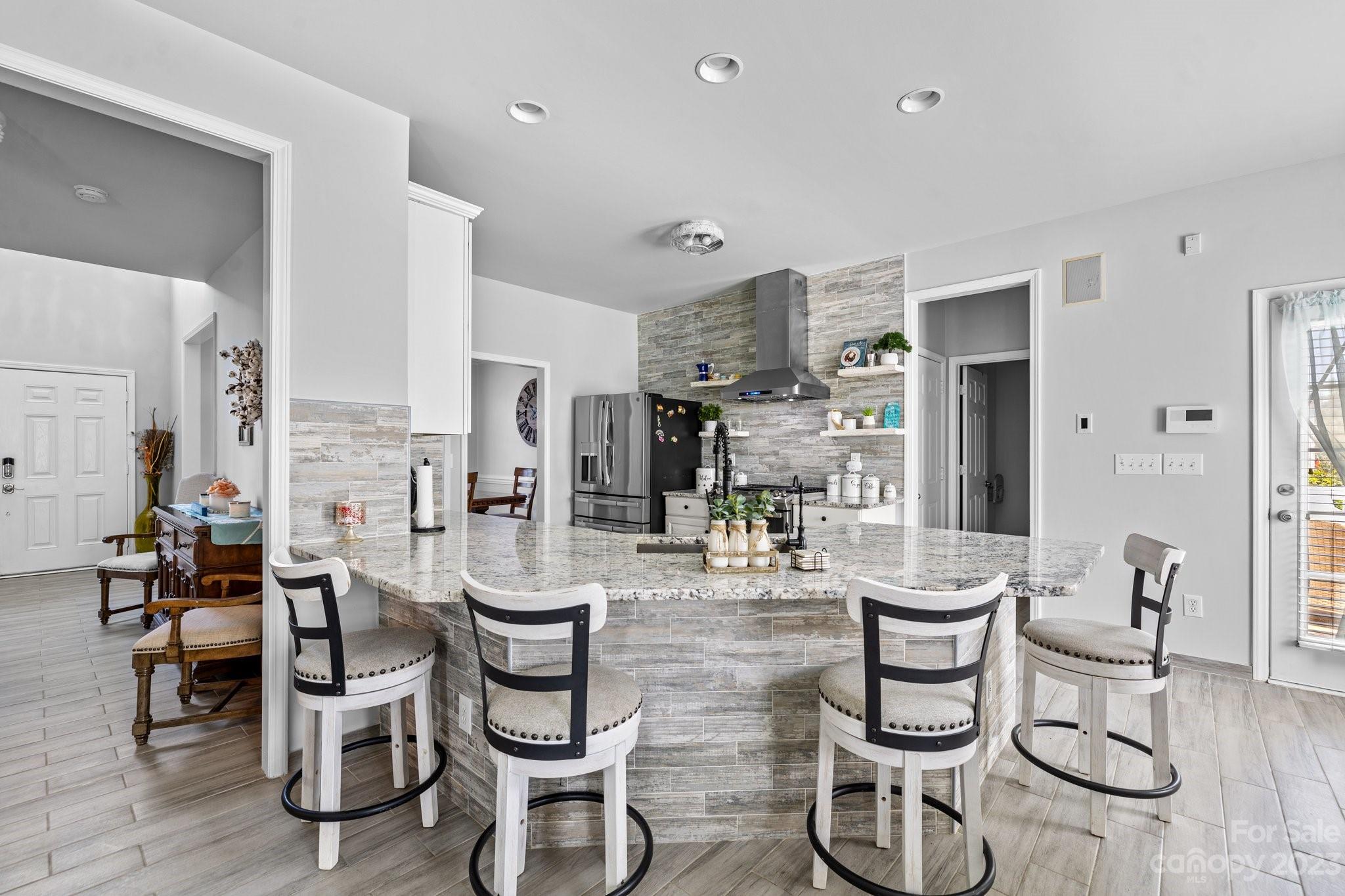 10834 Hellebore Road Charlotte, NC 28213 - Photo 13 of 41 a view of a dining room with furniture