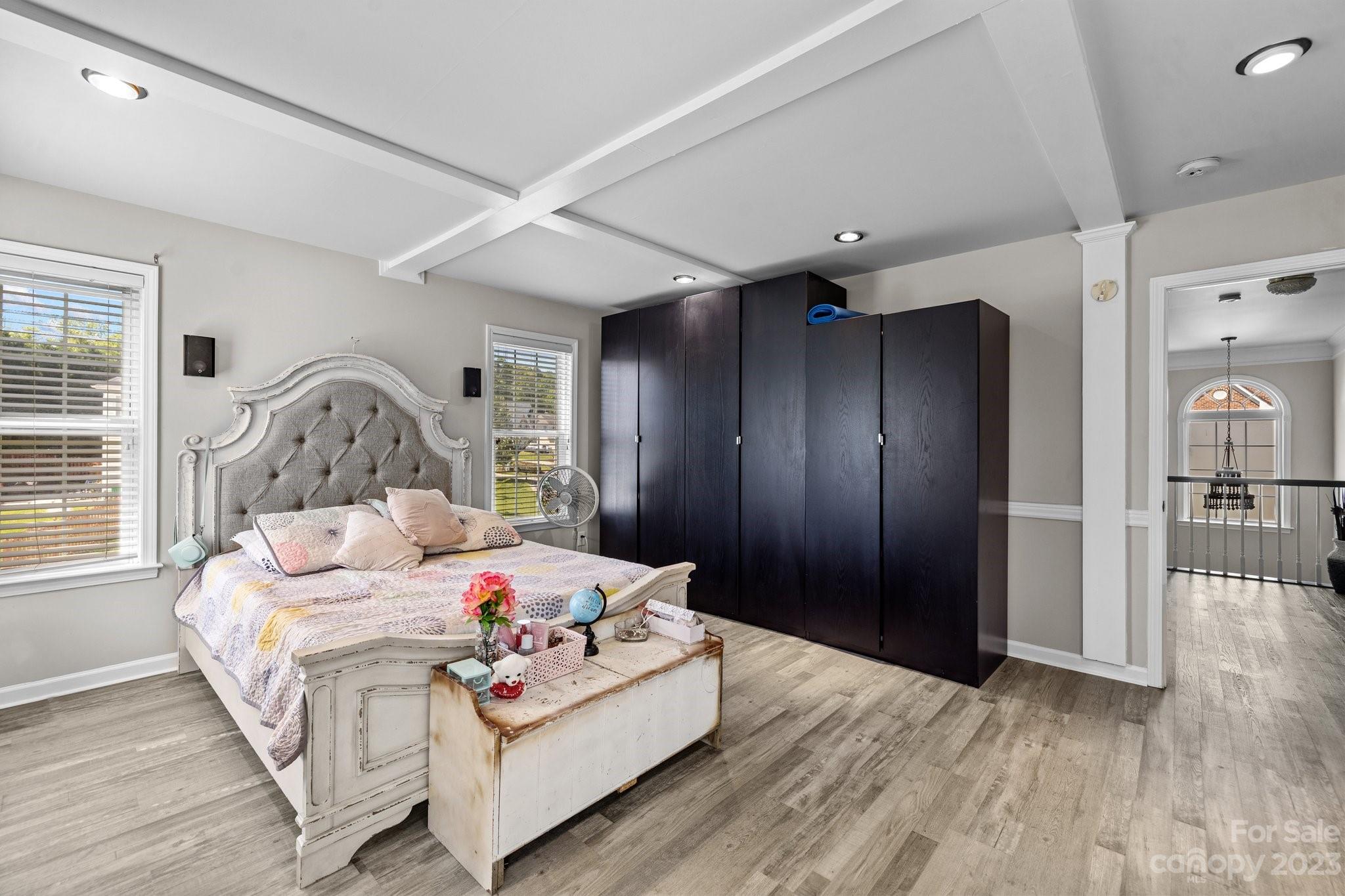 10834 Hellebore Road Charlotte, NC 28213 - Photo 22 of 41 a bedroom with a bed and a large window