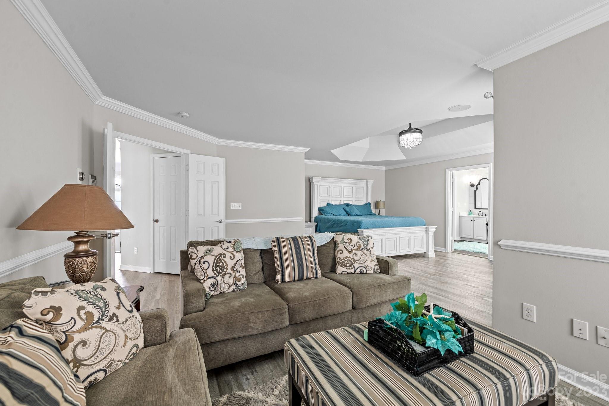 10834 Hellebore Road Charlotte, NC 28213 - Photo 25 of 41 a living room with furniture and a lamp