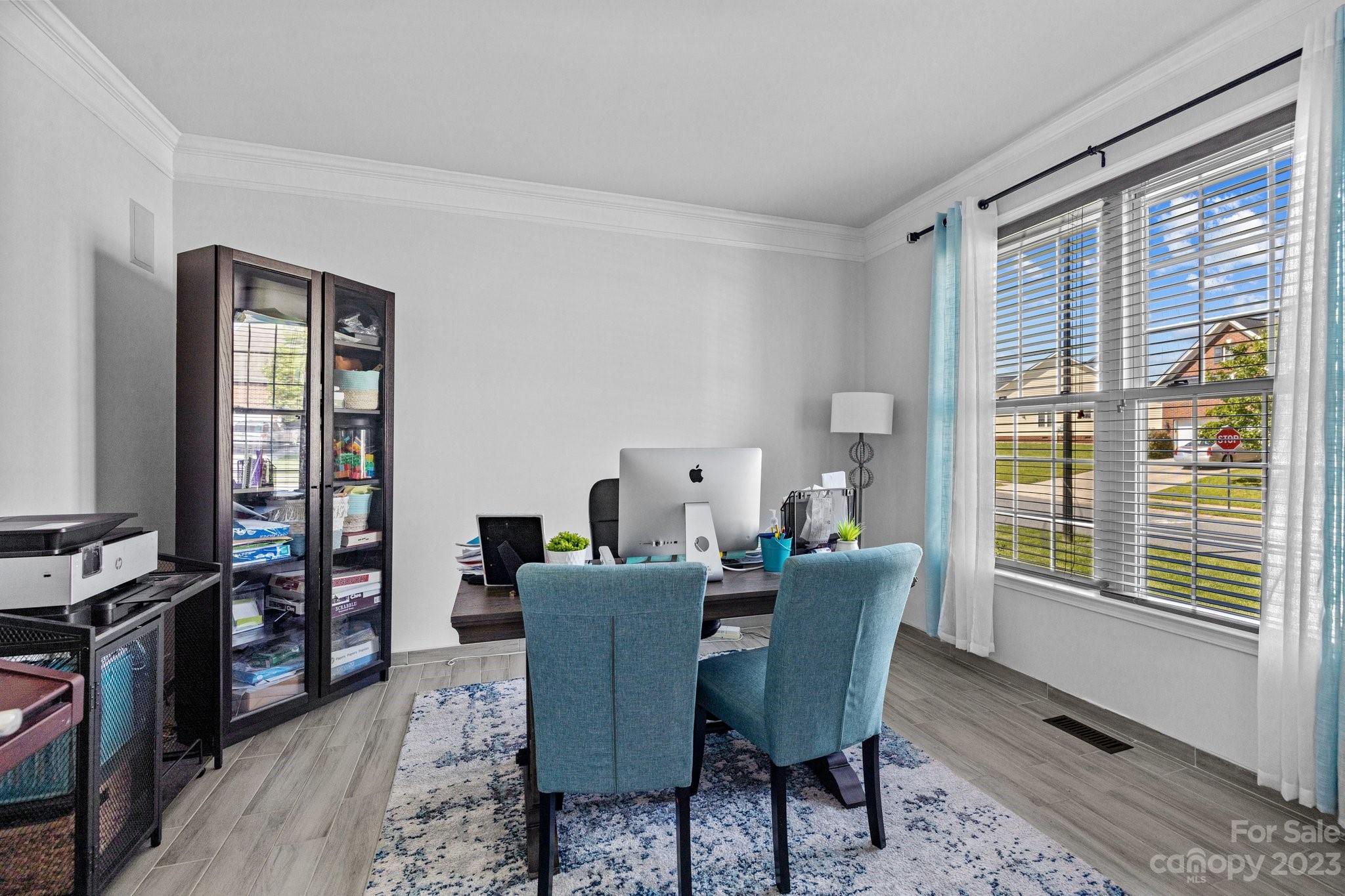 10834 Hellebore Road Charlotte, NC 28213 - Photo 31 of 41 a dining room with furniture and window