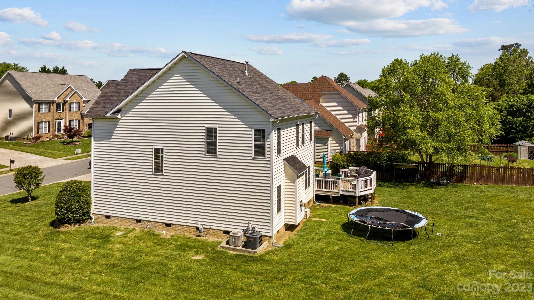 10834 Hellebore Road Charlotte, NC 28213 - Photo 35 of 41 a front view of a house with a yard