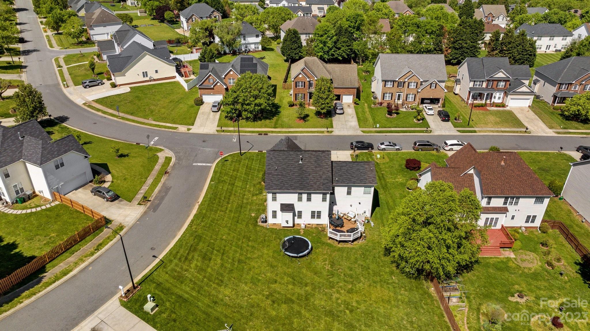 10834 Hellebore Road Charlotte, NC 28213 - Photo 37 of 41 an aerial view of residential houses with outdoor space