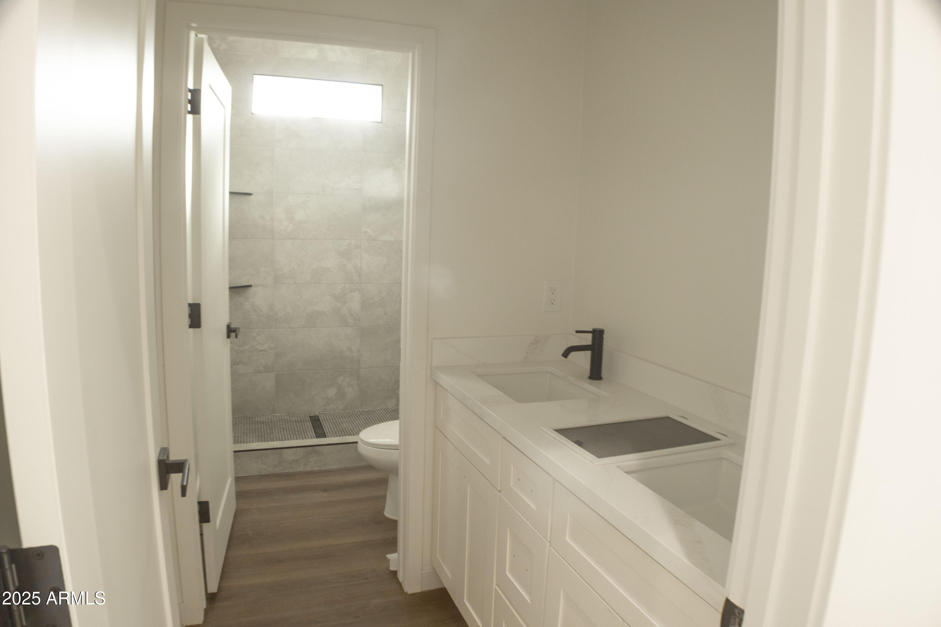 30 Tek Court Page, AZ 86040 - Photo 11 of 17 a bathroom with a sink a toilet and shower