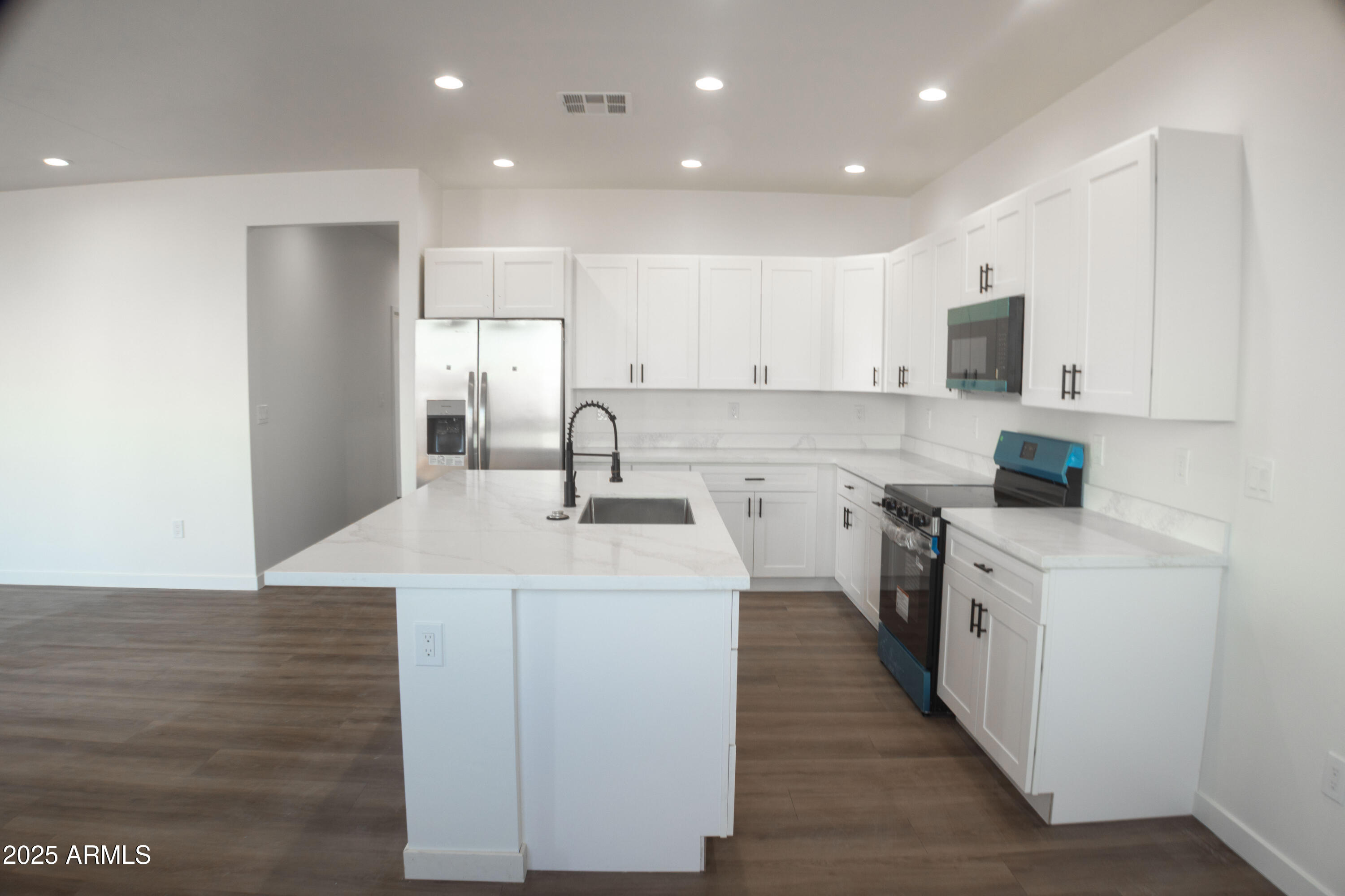 30 Tek Court Page, AZ 86040 - Photo 6 of 17 a kitchen with a sink stove and refrigerator