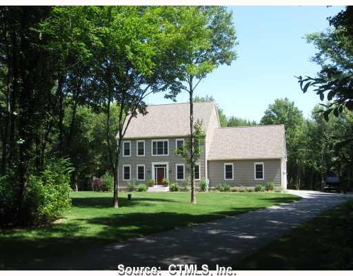 53 Witter Road Salem, CT 06420 - Photo 1 of 1 a front view of a house with a garden