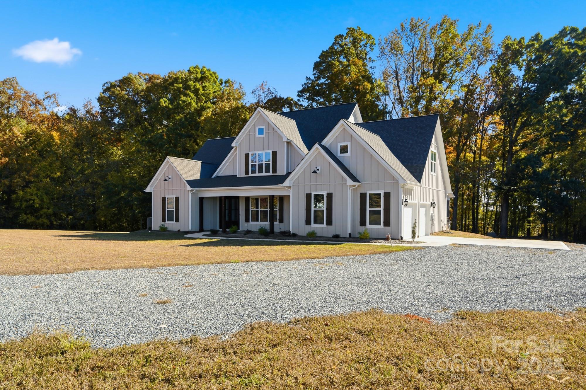 4105 Parkwood School Road Monroe, NC 28112 - Photo 4 of 47 a front view of a house with a yard