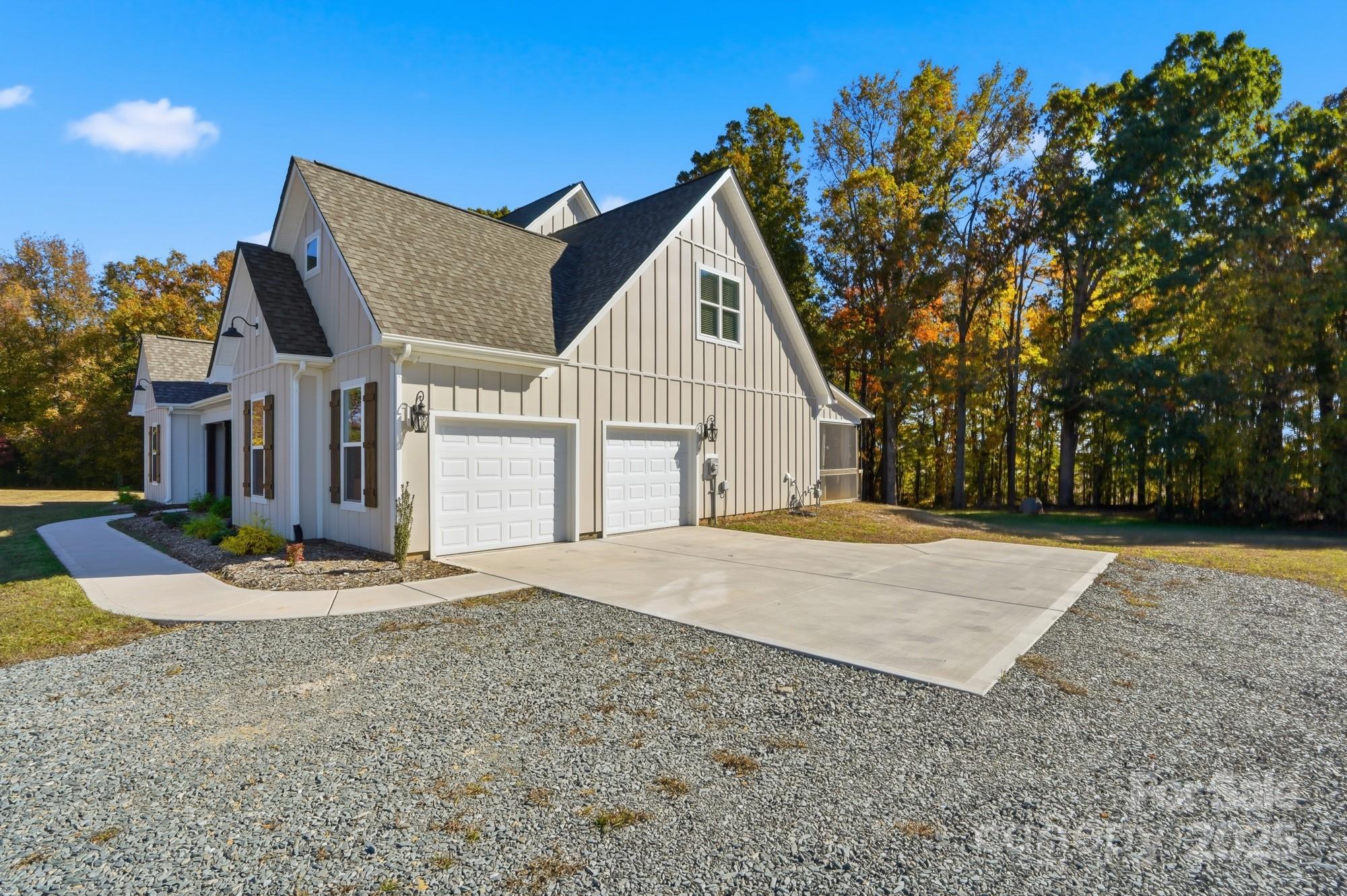 4105 Parkwood School Road Monroe, NC 28112 - Photo 5 of 47 a view of a house with a backyard and road