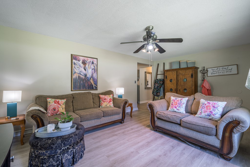 1813 John Smith Road East Blairsville, GA 30512 - Photo 3 of 41 a living room with furniture and wooden floor
