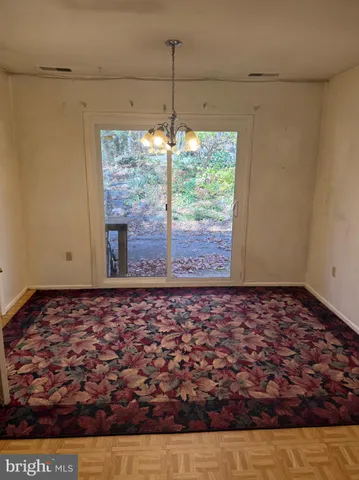 a view of a room with a large window