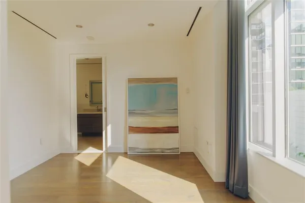 a kitchen with stainless steel appliances a sink and cabinets