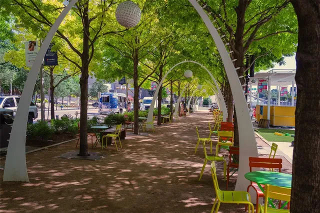 a view of balcony with seating space and a potted plant