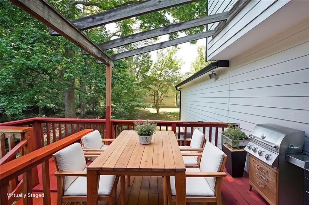 3087 Drexel Lane Rex, GA 30273 - Photo 2 of 22 a view of a patio with a table and chairs