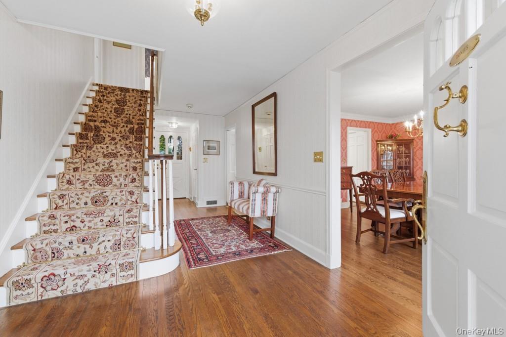 179 River Road Briarcliff Manor, NY 10510 - Photo 3 of 38 Entryway through to rear of home with curved bannister.