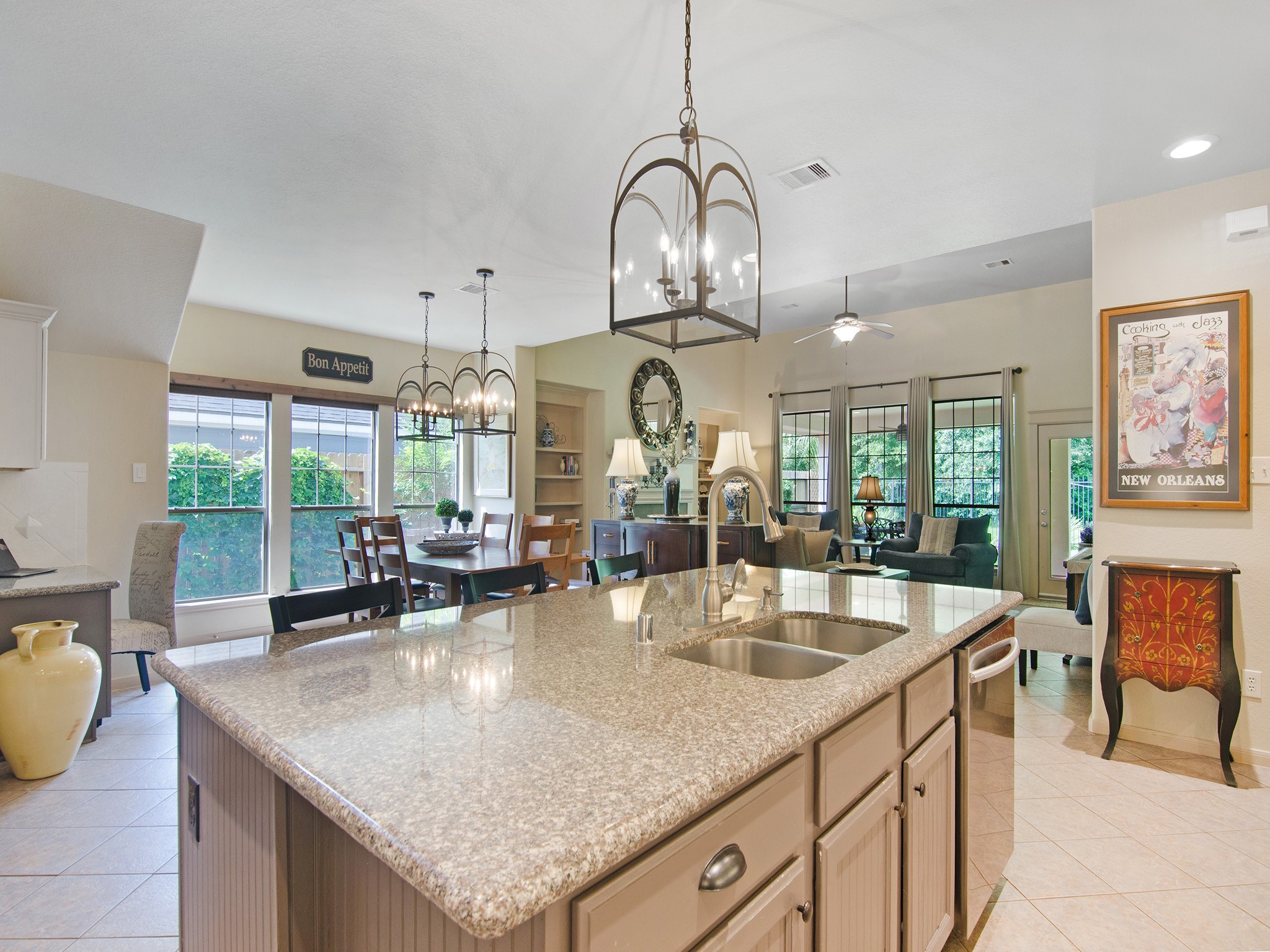 28323 Ryans Ridge Lane Spring, TX 77386 - Photo 10 of 45 From morning coffee to family dinners, the seamless flow between the kitchen and adjoining living spaces keeps everyone connected.