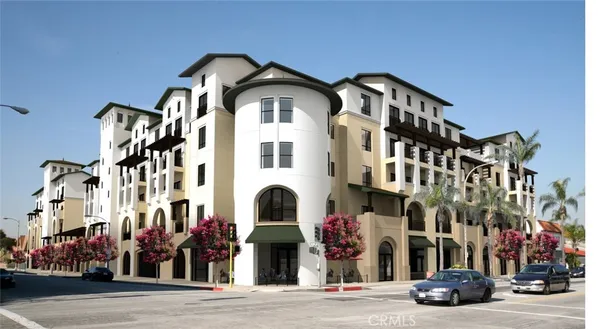 a front view of a building with a street
