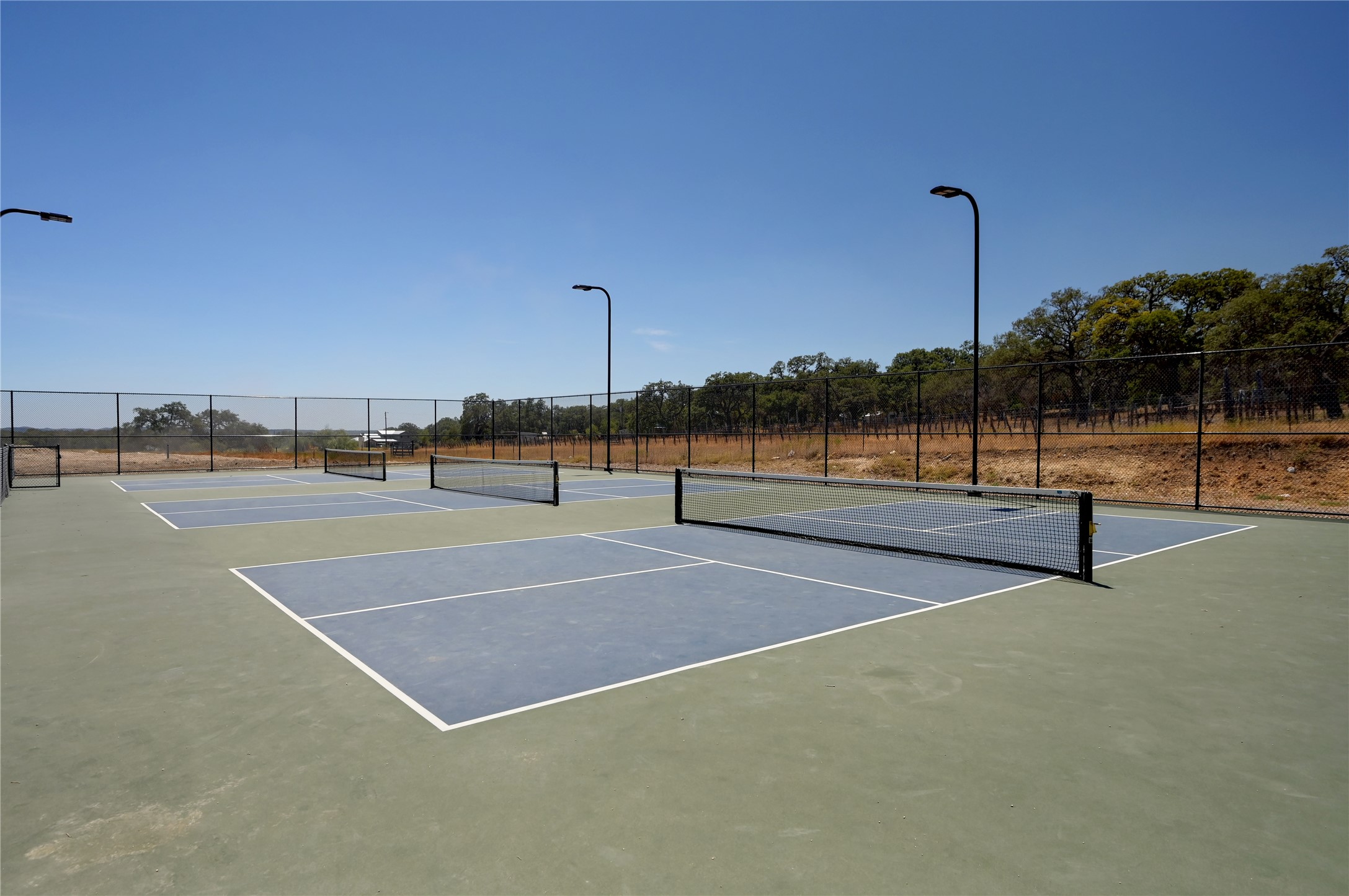 676 Annabelle Avenue Bulverde, TX 78163 - Photo 11 of 16 a view of a tennis court