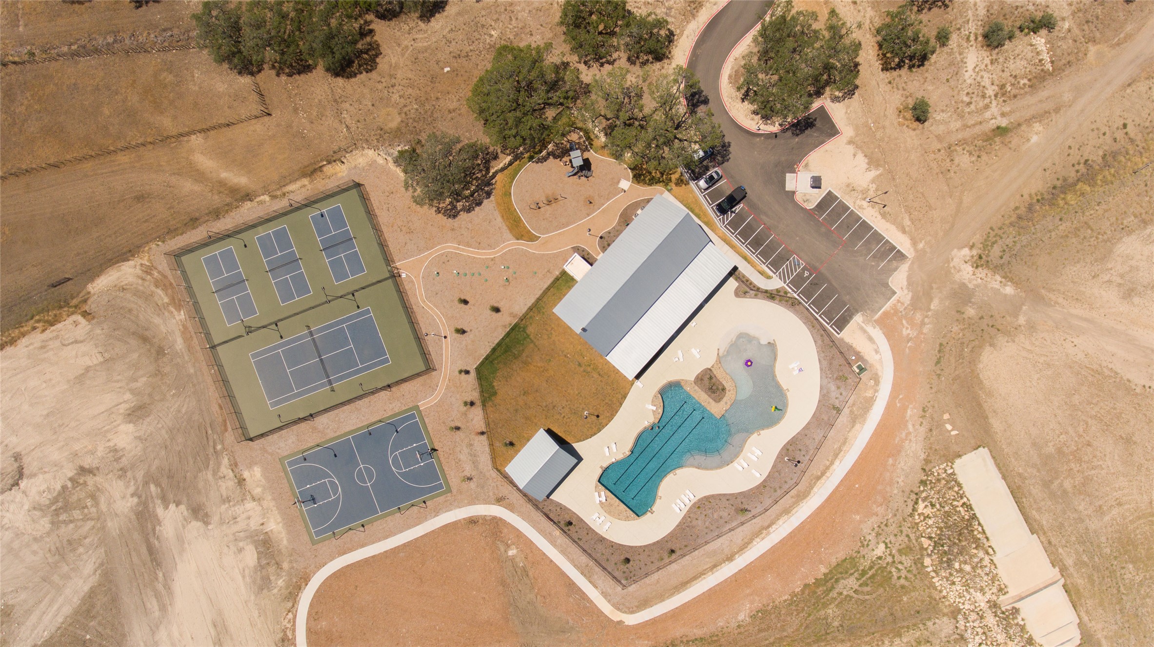 676 Annabelle Avenue Bulverde, TX 78163 - Photo 16 of 16 an aerial view of a house with a swimming pool