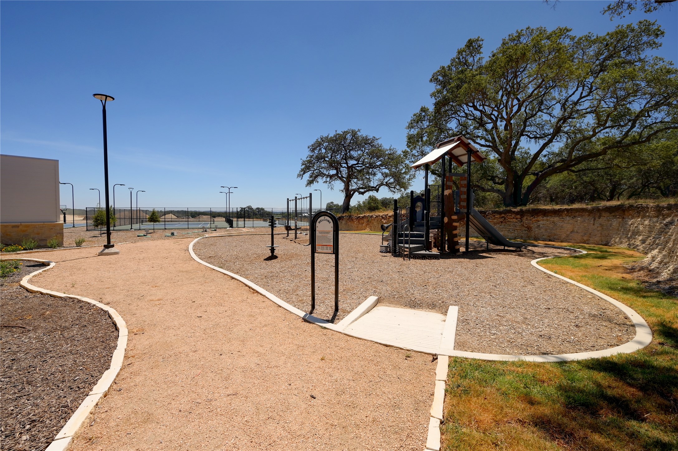 676 Annabelle Avenue Bulverde, TX 78163 - Photo 10 of 16 a view of a swimming pool with a yard