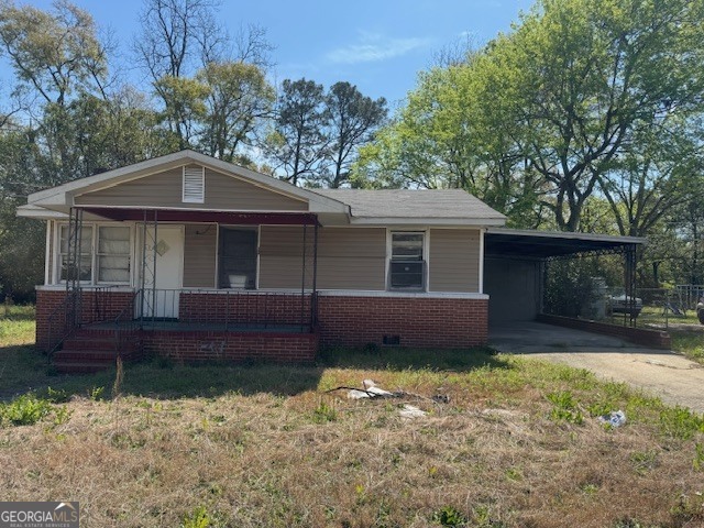 107 Benjamin Street Fort Valley, GA 31030 - Photo 1 of 26 a front view of a house with garden