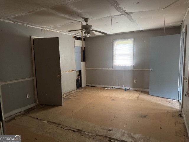 107 Benjamin Street Fort Valley, GA 31030 - Photo 14 of 26 an empty room with windows and electric appliances
