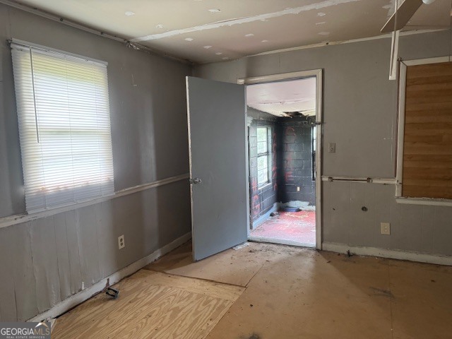 107 Benjamin Street Fort Valley, GA 31030 - Photo 19 of 26 an empty room with kitchen view