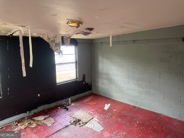 107 Benjamin Street Fort Valley, GA 31030 - Photo 20 of 26 a view of a livingroom with an empty space and a window