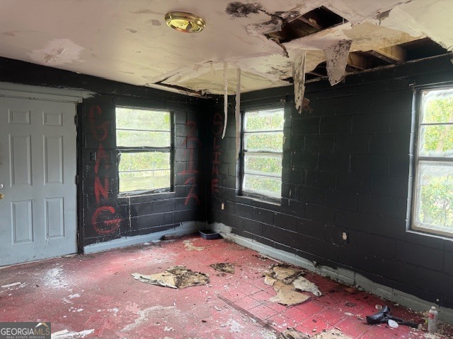 107 Benjamin Street Fort Valley, GA 31030 - Photo 21 of 26 wooden floor in an empty room with a window