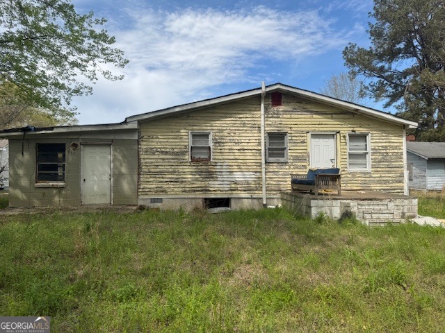 107 Benjamin Street Fort Valley, GA 31030 - Photo 26 of 26 a front view of a house with a yard