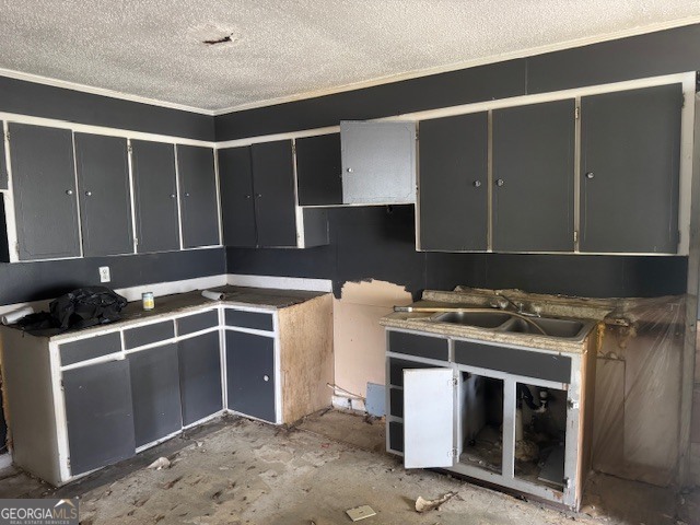 107 Benjamin Street Fort Valley, GA 31030 - Photo 3 of 26 a kitchen with stainless steel appliances granite countertop a stove and a sink