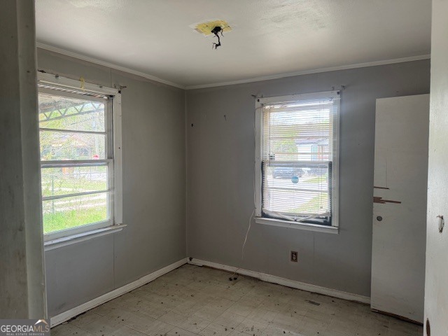 107 Benjamin Street Fort Valley, GA 31030 - Photo 5 of 26 an empty room with windows