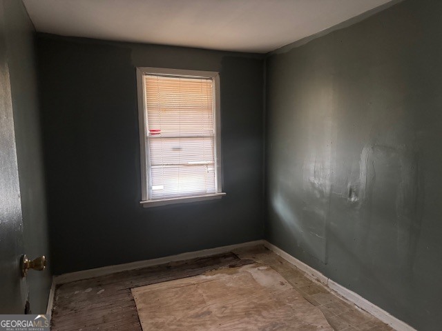 107 Benjamin Street Fort Valley, GA 31030 - Photo 8 of 26 an empty room with a window