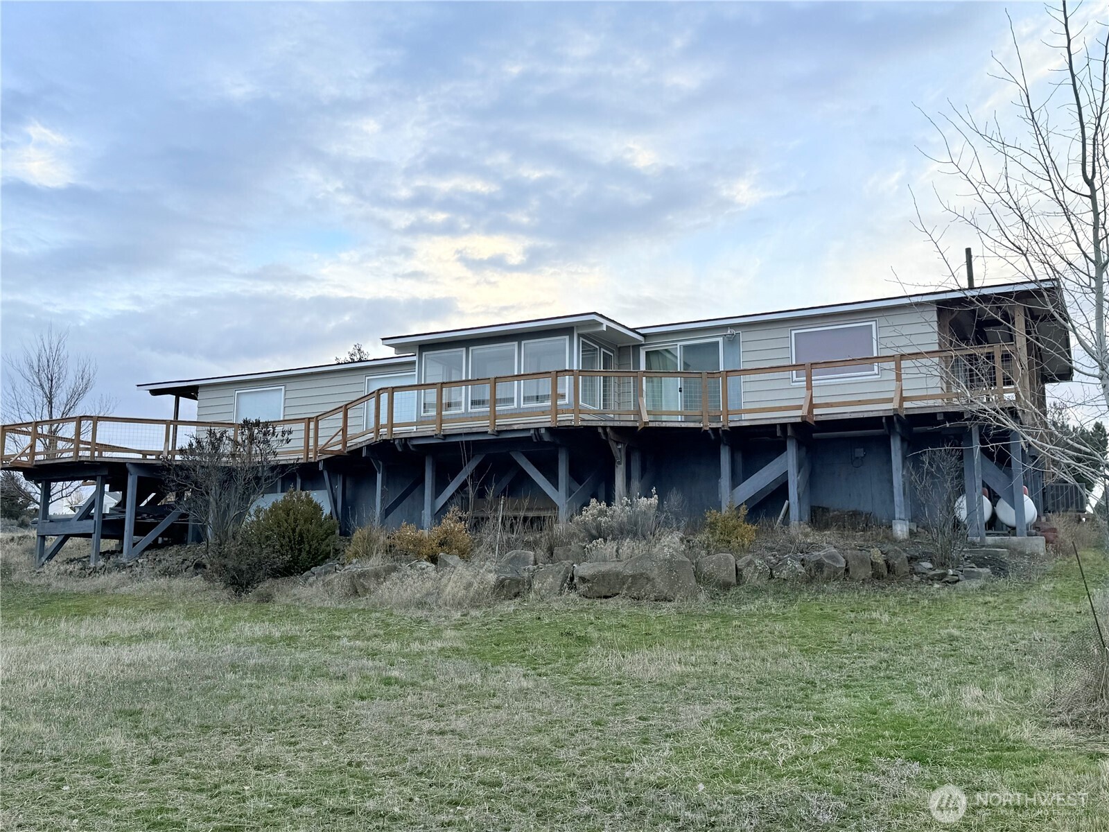 411 Southwest College Avenue Wilbur, WA 99185 - Photo 1 of 40 a view of a house with roof deck