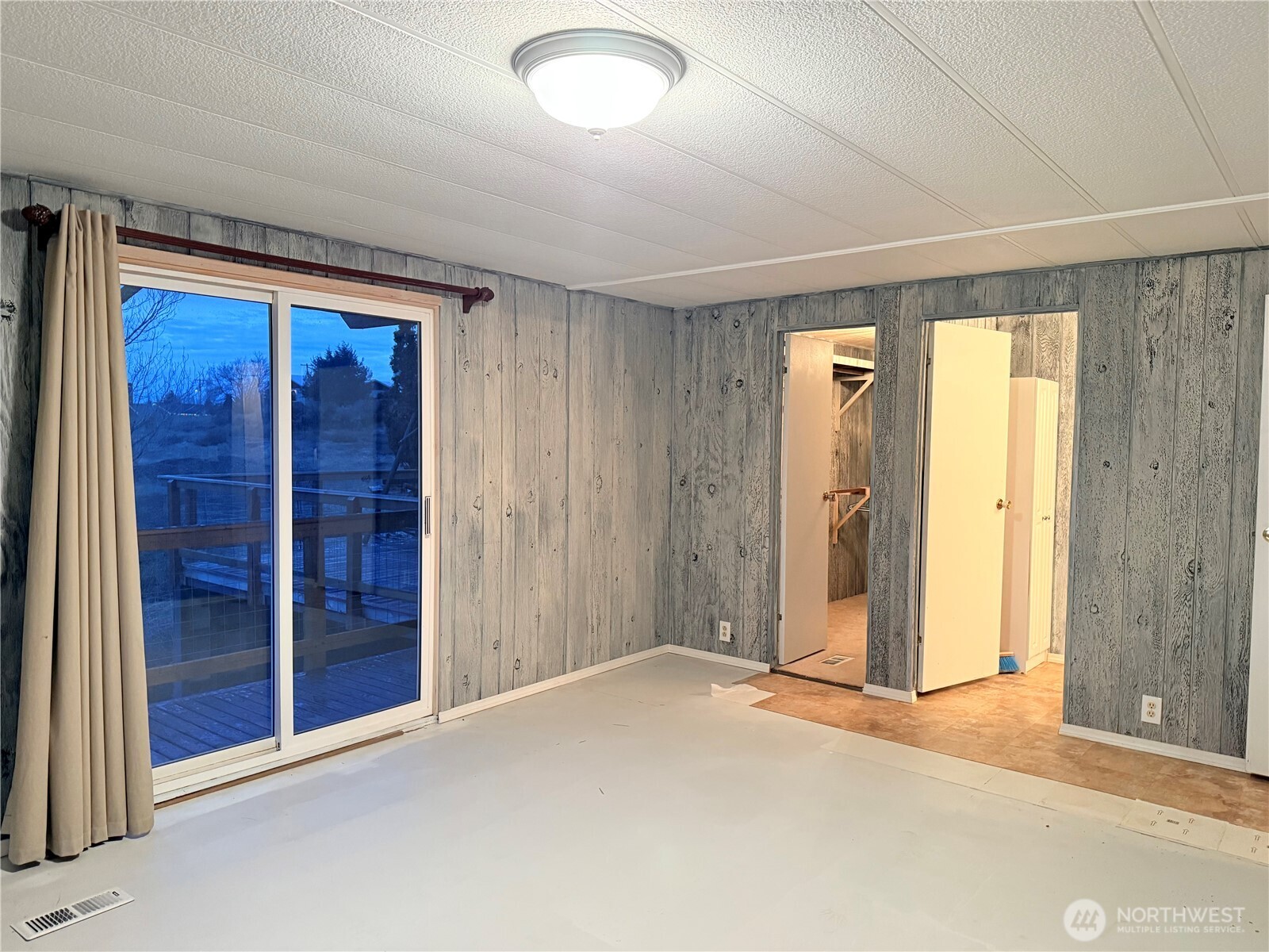 411 Southwest College Avenue Wilbur, WA 99185 - Photo 12 of 40 an empty room with closet and wooden floor