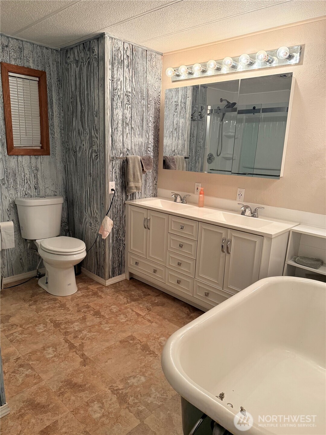 411 Southwest College Avenue Wilbur, WA 99185 - Photo 14 of 40 a bathroom with a double vanity sink mirror and toilet