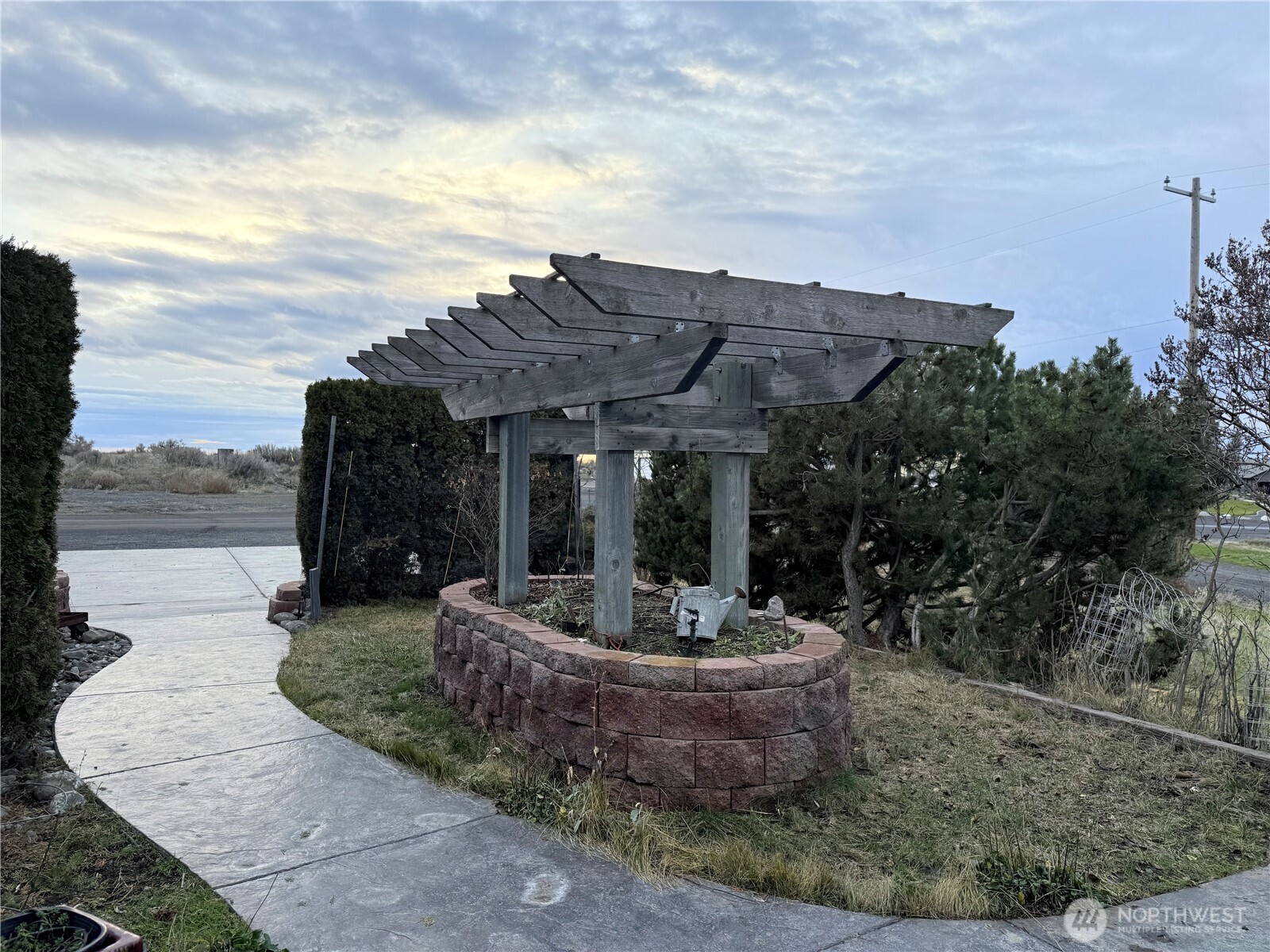 411 Southwest College Avenue Wilbur, WA 99185 - Photo 30 of 40 a view of a patio with furniture and a small yard