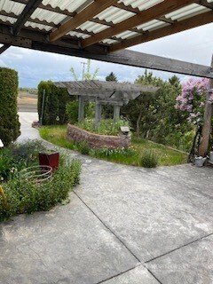411 Southwest College Avenue Wilbur, WA 99185 - Photo 31 of 40 a front view of a house with a yard