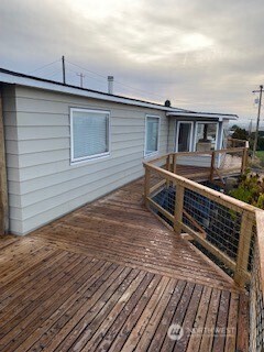 411 Southwest College Avenue Wilbur, WA 99185 - Photo 36 of 40 a view of a house with a roof deck