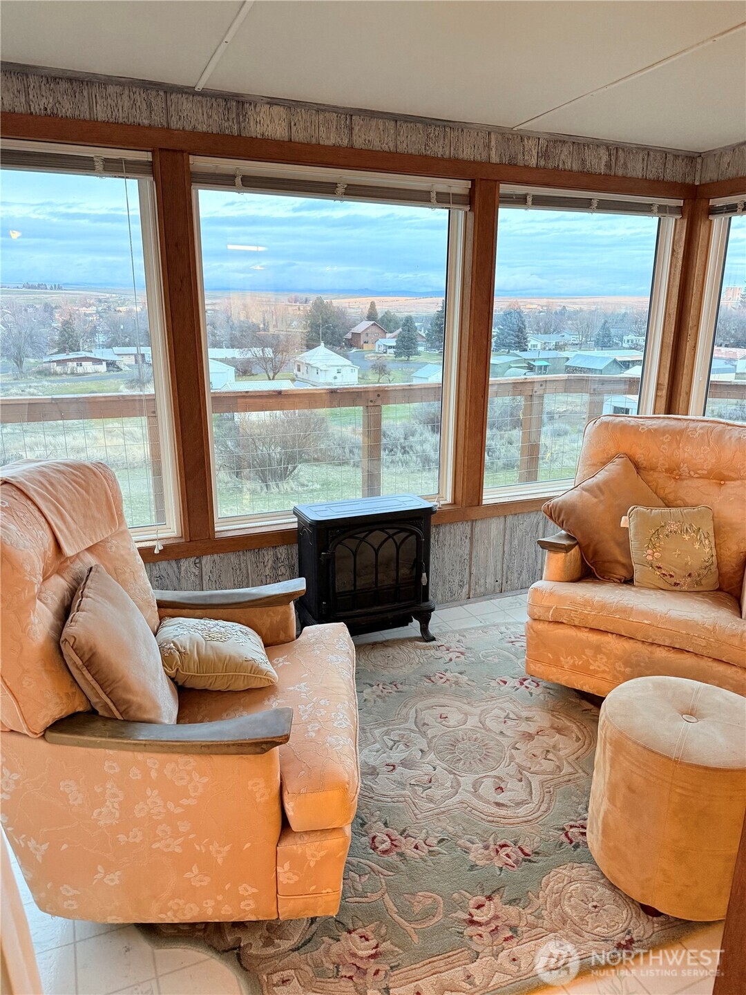 411 Southwest College Avenue Wilbur, WA 99185 - Photo 9 of 40 a living room with furniture and a large window