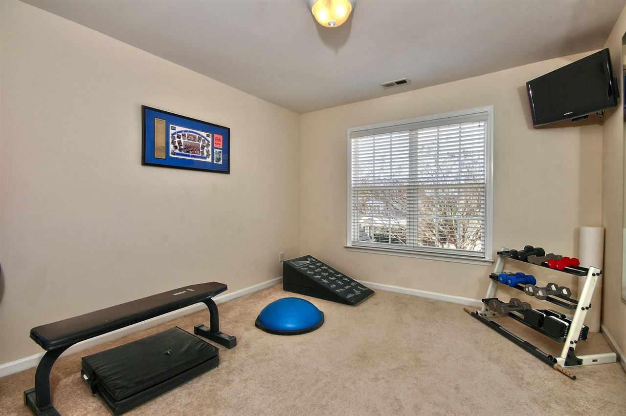 7616 Derek Drive Raleigh, NC 27613 - Photo 18 of 25 Also a great room to work out in or if you enjoy crafting or want a man cave, this is it! Mirrored wall and the full bathroom is right across the hall. Bedroom