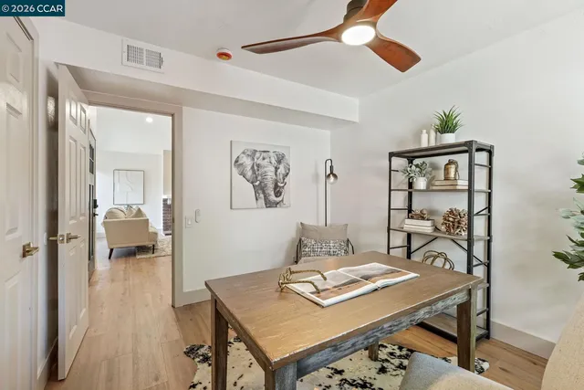 a workspace with furniture and window