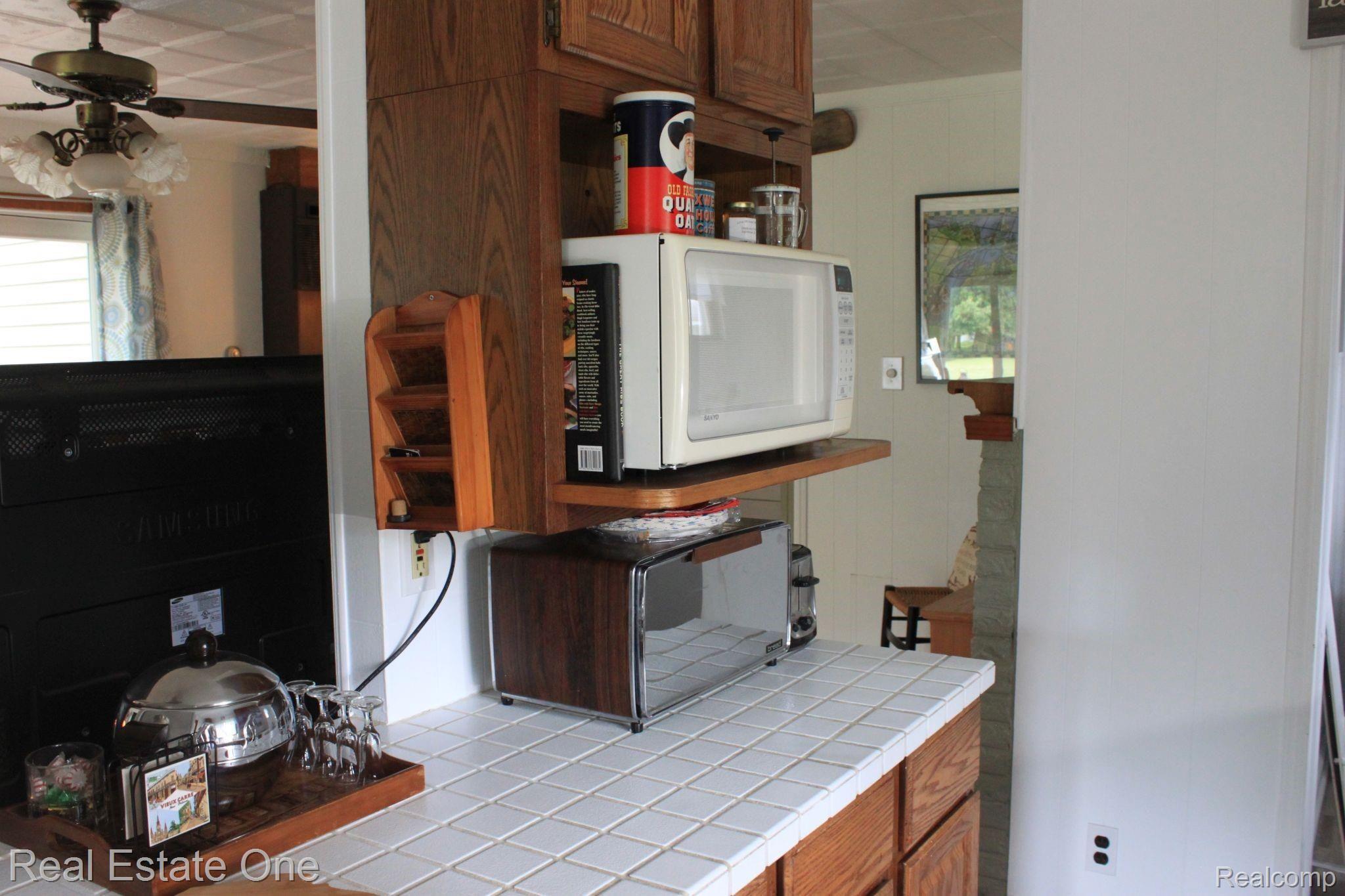 5475 North Cedar River Road Gladwin, MI 48624 - Photo 22 of 64 ceramic counters.JPG